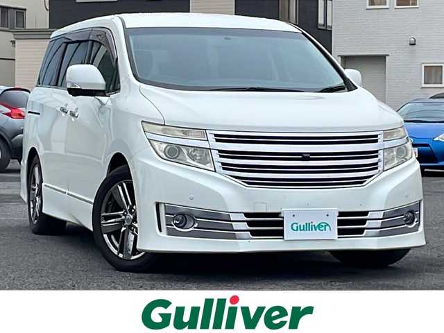 日産 エルグランド ライダー 黒本革 マニュアルシート 道央・札幌 2012(平24)年 12.5万km ブリリアントホワイトパール ４WD/純正メーカーナビ/AM/FM/BT/フルセグ/純正フリップダウンモニター/横滑り防止装置/コーナーセンサー/アラウンドビューモニター/ビルトインETC/ドライブレコーダー/ECOMODE/センターデフロック/両側パワースライドドア/N席/２列目オットマン/レザーシート/革巻きステアリング/ステアリングリモコン/AC100V/MTモード付AT/プッシュスタート/スマートキー/HIDヘッドライト/オートライト/フォグランプ/電動格納ミラー/ウィンカーミラー/純正フロアマット/ドアバイザー/スペアキー/社外エンジンスターター/社外AW付冬タイヤ積込/215/65/R16/2021年/山5mm