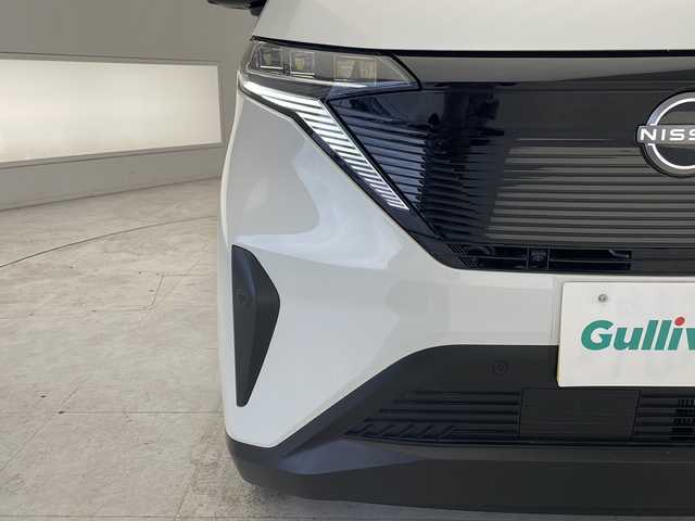 日産 サクラ X 愛知県 2024(令6)年 0.2万km ホワイトパール 衝突被害軽減ブレーキ/純正9インチディスプレイオーディオ（ナビ無し）/全方位カメラ/Bluetooth/バックカメラ/コーナーセンサー/純正アルミホイール/LEDヘッドライト/オートマチックハイビーム/ステアリングスイッチ/スマートキー/プッシュスタート