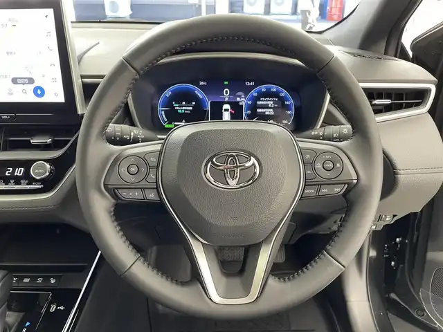 トヨタ カローラ クロス ハイブリッド Z 滋賀県 2025(令7)年 0.1千km ブラックマイカ 純正10.5インチナビ/Bluetooth/フルセグTV/USB/ミラーリング/全方位カメラ/ハーフレザーシート/パノラマガラスルーフ/パワーバックドア/パワーシート/シートヒーター/エアーシート/ステアリングリモコン/ETC2.0/前後ドライブレコーダー