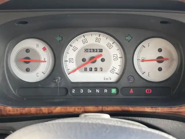 ダイハツ ミラ ジーノ 静岡県 2002(平14)年 8.7万km ライトブルー 社外ディスプレイオーディオ(FH-780DVD)/　AM FM CD DVD/本木製/革巻きステアリング/丸型ハロゲンヘッドランプ/ベージュチェック柄ファブリックシート/純正フロアマット/リモコンキー/スペアキー有/マニュアルエアコン/取扱説明書/ブラウン木目調センターパネル/13インチ白アルミホイール