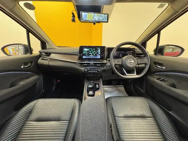 日産 オーラ G レザーエディション 群馬県 2022(令4)年 7.1万km ガーネットレッド/スーパーブラック 2トーン 安全性能/・プロパイロット/・エマージェンシーブレーキ/・車線逸脱防止支援/・ブラインドスポットモニター/・速度標識表示/・駐車支援/純正9インチメモリナビ/　　フルセグ/Bluetooth/    USB/HDMI/FM/AM/    AppleCarPlay/AndroidAuto/BOSEサウンド/アラウンドビューモニター/デジタルインナーミラー/オートLEDヘッドライト/フォグランプ/黒革シート/前席シートヒーター/ステアリングヒーター/置くだけ充電/スマートキー2本/純正フロアマット/純正17AW/前後ドライブレコーダー/ビルドインETC2.0