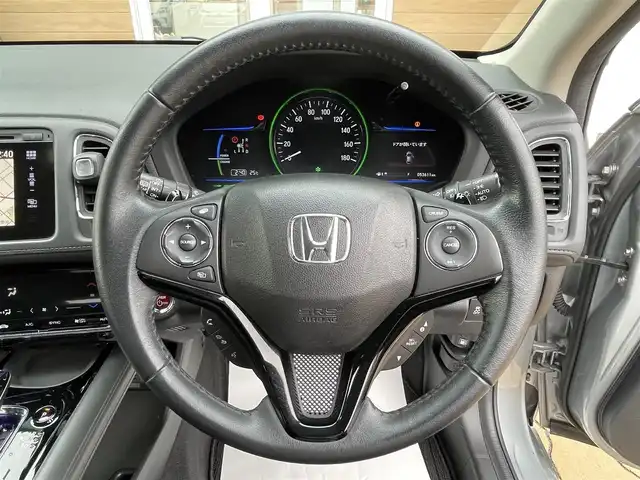 ホンダ ヴェゼル ハイブリッド Z 宮崎県 2014(平26)年 5.4万km ティンテッドシルバーM 衝突軽減ブレーキ　/純正ナビ/ＬＥＤ　/ＥＴＣ　/フルセグＴＶ　/クルーズコントロール　/スマートキー　/純正フロアマット　/純正アルミホイール　/ハーフレザー　/シートヒーター　/パドルシフト　/ドアバイザー