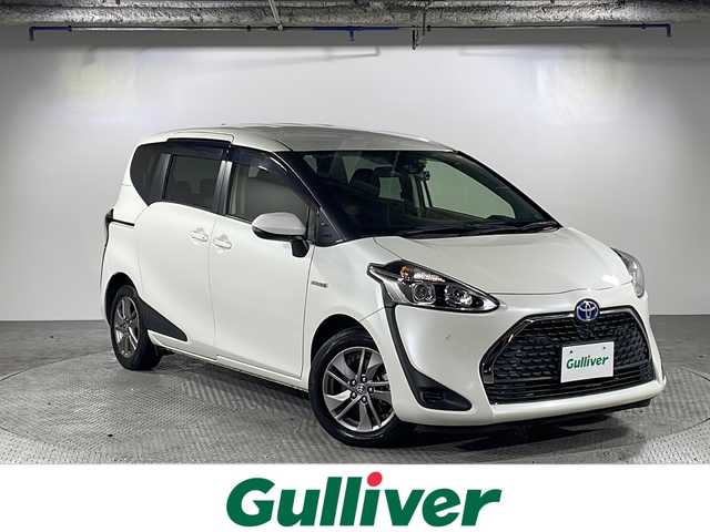 トヨタ シエンタ ハイブリッド G 沖縄県 2019(平31)年 1.7万km ホワイトパールクリスタルシャイン 禁煙車/県外仕入れ/7人乗り/純正7インチナビ/【CD/DVD/フルセグTV/BT】/バックカメラ/ETC/前後ドライブレコーダー/ステアリングリモコン/ステアリングヒーター/ヘッドアップディスプレイ/トヨタセーフティセンス/→プリクラッシュセーフティ/→前後コーナーセンサー/→レーンキープアシスト/→オートマチックハイビーム/オートライト/スマートキー
