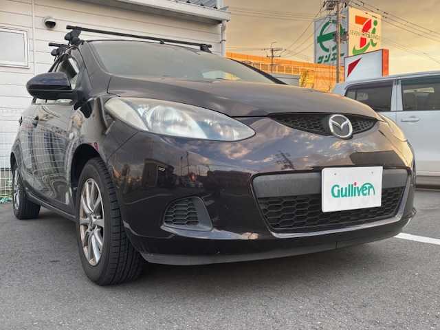 マツダ デミオ 13C 宮城県 2010(平22)年 11.6万km ラディアントエボニーマイカ 登録時走行距離１１５８３９ｋｍ/シートカバー/ステアリングカバー/レベライザー/電格ミラー/純正ワンセグナビ/AM/FM/iPad/ETC(社外)/スタッドレスタイヤ付き/夏タイヤAW付き