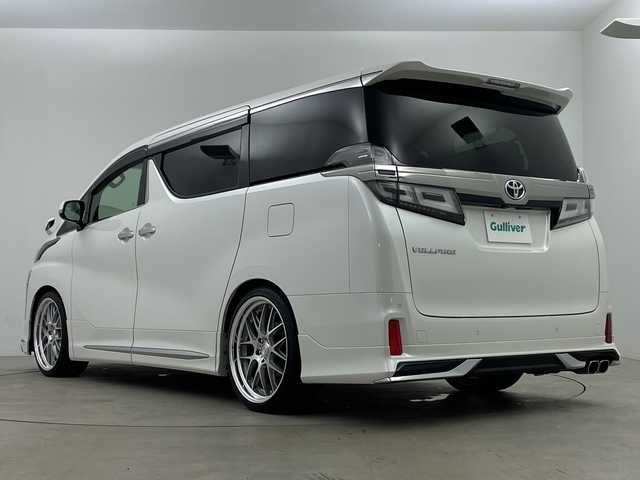 トヨタ ヴェルファイア Z Gエディション 鹿児島県 2020(令2)年 1.6万km パール 純正9インチナビゲーション/CD/DVD/SD/フルセグ/Bluetooth/デジタルインナーミラー/ローダウン/社外21インチアルミホイール/D/Nパワーシート/D/Nシートヒーター/D/Nベンチレーション/両側ぱわースライドドア/オットマン/モデリスタエアロ/ETC/純正フリップダウンモニター/LEDヘッドライト/ ブラインドスポットモニター/レーダークルーズコントロール/ビルトインETC