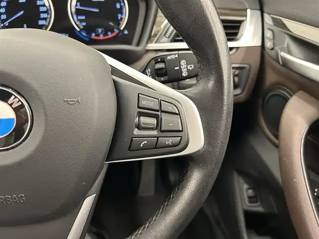 ＢＭＷ Ｘ１ xDrive 20i Xライン 岡山県 2018(平30)年 0.6万km ミネラルホワイト アドバンスドアクティブセーフティパッケージ/コンフォートアクセス/ACC/HUD/オートマチックテールゲート/ブラウンレザーシート/シートヒーター/電動シート/純正ナビ/Bカメラ