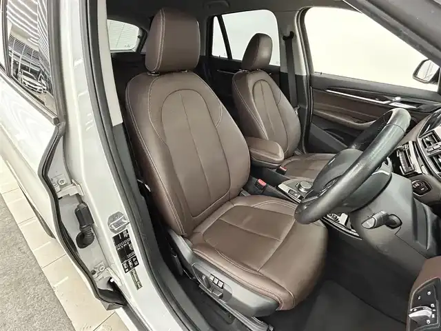 ＢＭＷ Ｘ１ xDrive 20i Xライン 岡山県 2018(平30)年 0.6万km ミネラルホワイト アドバンスドアクティブセーフティパッケージ/コンフォートアクセス/ACC/HUD/オートマチックテールゲート/ブラウンレザーシート/シートヒーター/電動シート/純正ナビ/Bカメラ