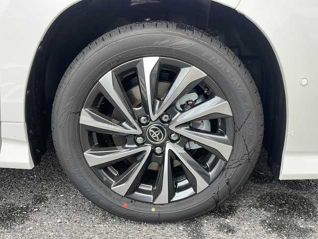 トヨタ ヴォクシー ハイブリッド S－Z 広島県 2025(令7)年 0.1万km未満 ホワイトパールクリスタルシャイン /登録時走行距離/　　　　　　　19キロ/ワンオーナー/純正ナビ/全方位モニター/地デジ/ハーフレザーシート/シートヒーター/左パワーステップ/両側パワースライドドア/パワーバックドア/2列目オットマンシート/クルーズコントロール/HUD/デジタルインナーミラー/スペアキー×１/ビルトインETC/新車時整備手帳/　　【保証書】/取扱説明書/