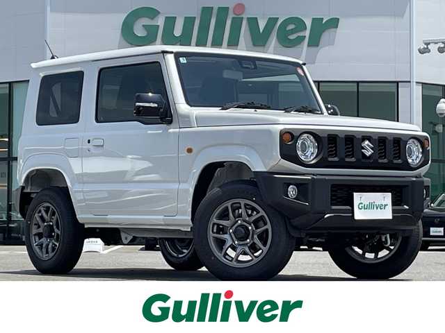 スズキ ジムニー XC 佐賀県 2025(令7)年 0.1万km未満 ピュアホワイトP ワンオーナー/パートタイム４WD/クルーズコントロール/車線逸脱警報システム/衝突被害軽減ブレーキ/クリアランスソナー/D＋N席シートヒーター/ミラーヒーター/ステアリングリモコン/オートマチックハイビーム/ウィンカーミラー/純正16インチアルミホイール/純正LEDヘッドライト/純正フォグライト/新車保証書/取扱説明書/スペアキー１本