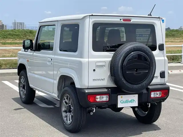 スズキ ジムニー XC 佐賀県 2025(令7)年 0.1万km未満 ピュアホワイトP ワンオーナー/パートタイム４WD/クルーズコントロール/車線逸脱警報システム/衝突被害軽減ブレーキ/クリアランスソナー/D＋N席シートヒーター/ミラーヒーター/ステアリングリモコン/オートマチックハイビーム/ウィンカーミラー/純正16インチアルミホイール/純正LEDヘッドライト/純正フォグライト/新車保証書/取扱説明書/スペアキー１本