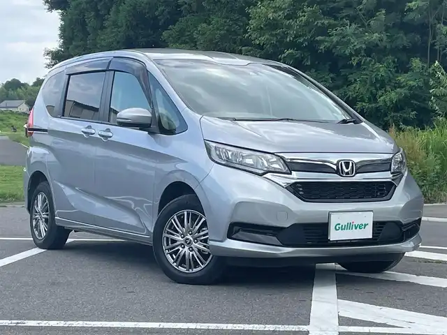 ホンダ フリード G ホンダセンシング 福島県 2022(令4)年 1.3万km ルナシルバーM ワンオーナー車/純正ナビ/　DISC・USB・FM＆AM/プッシュスタート/スマートキー/スペアキー/クルーズコントロール追従あり/ドライブレコーダー前後/バックカメラ/純正エンジンスターター/電格ミラー/ステアリングリモコン/レーンキープアシスト/オートライト/コーナーセンサー/両側パワースライドドア/純正フロアマット/両席シートヒーター