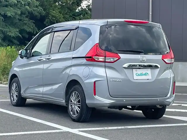 ホンダ フリード G ホンダセンシング 福島県 2022(令4)年 1.3万km ルナシルバーM ワンオーナー車/純正ナビ/　DISC・USB・FM＆AM/プッシュスタート/スマートキー/スペアキー/クルーズコントロール追従あり/ドライブレコーダー前後/バックカメラ/純正エンジンスターター/電格ミラー/ステアリングリモコン/レーンキープアシスト/オートライト/コーナーセンサー/両側パワースライドドア/純正フロアマット/両席シートヒーター