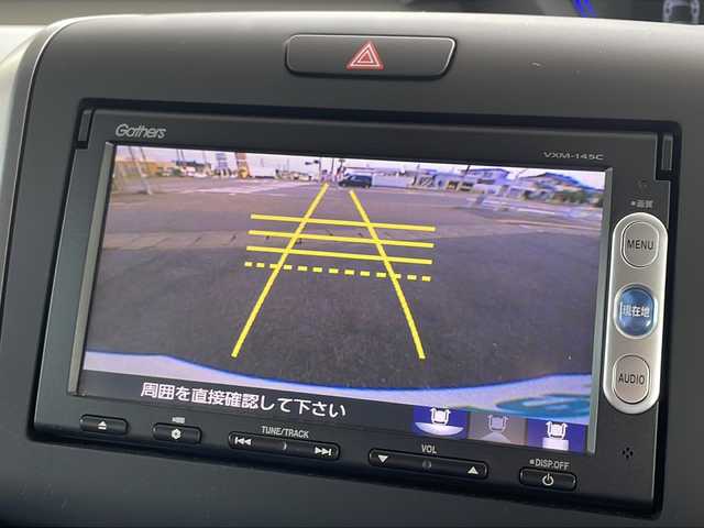 ホンダ フリード G ホンダセンシング 福島県 2022(令4)年 1.3万km ルナシルバーM ワンオーナー車/純正ナビ/　DISC・USB・FM＆AM/プッシュスタート/スマートキー/スペアキー/クルーズコントロール追従あり/ドライブレコーダー前後/バックカメラ/純正エンジンスターター/電格ミラー/ステアリングリモコン/レーンキープアシスト/オートライト/コーナーセンサー/両側パワースライドドア/純正フロアマット/両席シートヒーター