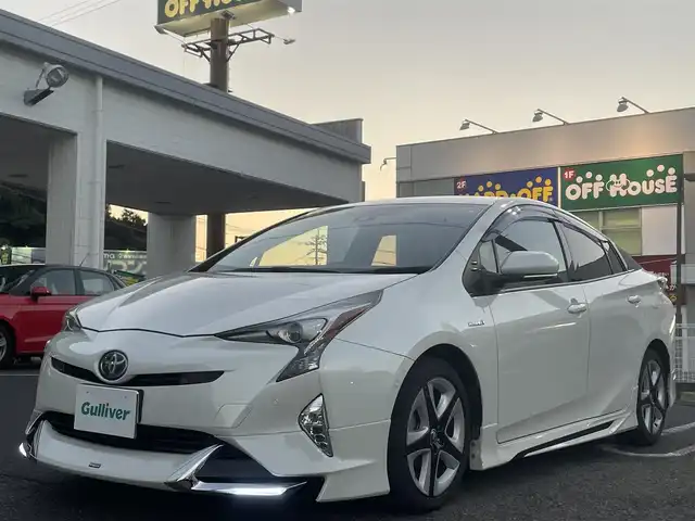 トヨタ プリウス A ツーリングセレクション 長崎県 2018(平30)年 7.6万km ホワイトパールクリスタルシャイン 社外SDナビ/・AM/FM/BT/CD/DVD/HDMI/フルセグTV/バックカメラ/モデリスタエアロ/ステアリングスイッチ/クルーズコントロール/HUD/プリクラッシュセーフティ/コーナーセンサー/BSM/ふらつき検知/ビルトインETC/前席シートヒーター/前方ドライブレコーダー/フロアマット/取扱説明書/スペアキー/エンジンスターター