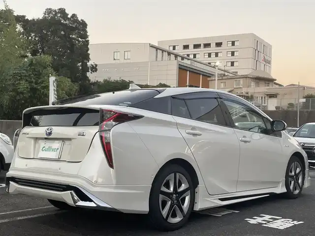 トヨタ プリウス A ツーリングセレクション 長崎県 2018(平30)年 7.6万km ホワイトパールクリスタルシャイン 社外SDナビ/・AM/FM/BT/CD/DVD/HDMI/フルセグTV/バックカメラ/モデリスタエアロ/ステアリングスイッチ/クルーズコントロール/HUD/プリクラッシュセーフティ/コーナーセンサー/BSM/ふらつき検知/ビルトインETC/前席シートヒーター/前方ドライブレコーダー/フロアマット/取扱説明書/スペアキー/エンジンスターター