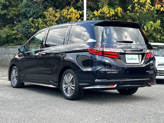 ホンダ オデッセイ ハイブリッド アブソルート・EXホンダセンジング 大阪府 2019(平31)年 2.7万km プレミアムヴィーナスブラックP BSM/11.6インチ純正ナビ(BT/フルセグ/HDMI/USB/DVD)/アラウンドビューモニター/フリップダウンモニター/レーダークルーズコントロール/衝突被害軽減システム/レーンキープアシスト/両側パワースライドドア/パワーシート/シートヒーター/ハーフレザーシート/ETC2.0/LEDヘッドライト/オートライト/オートマチックハイビーム/純正フロアマット/純正アルミホイール/スペアキー