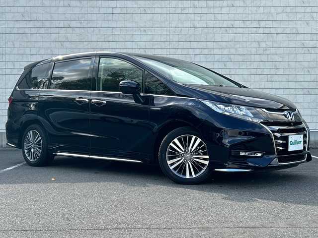 ホンダ オデッセイ ハイブリッド アブソルート・EXホンダセンジング 大阪府 2019(平31)年 2.7万km プレミアムヴィーナスブラックP BSM/11.6インチ純正ナビ(BT/フルセグ/HDMI/USB/DVD)/アラウンドビューモニター/フリップダウンモニター/レーダークルーズコントロール/衝突被害軽減システム/レーンキープアシスト/両側パワースライドドア/パワーシート/シートヒーター/ハーフレザーシート/ETC2.0/LEDヘッドライト/オートライト/オートマチックハイビーム/純正フロアマット/純正アルミホイール/スペアキー