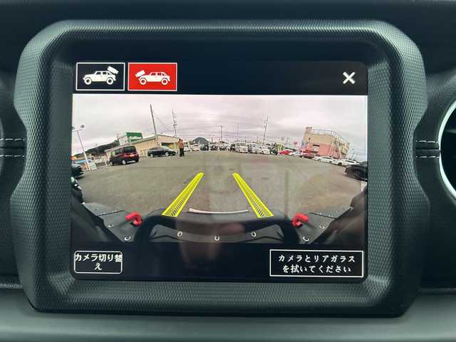 クライスラー・ジープ ジープ ラングラー アンリミテッド サハラ 山口県 2024(令6)年 2.5万km 白 ワンオーナー車/純正ナビ/Bluetooth/フルセグTV/バックカメラ/LEDヘッドライト/LEDフォグライト/オートライト/コーナーセンサー/スマートキー＆プッシュスタート/クルーズコントロール/黒レザーシート/前席シートヒーター/ステアリングヒーター/社外バンパー（純正あり）/社外マフラー（純正あり）/社外17インチAW（純正18インチAWあり）/社外グリル（純正あり）/保証書/スペアキー1個