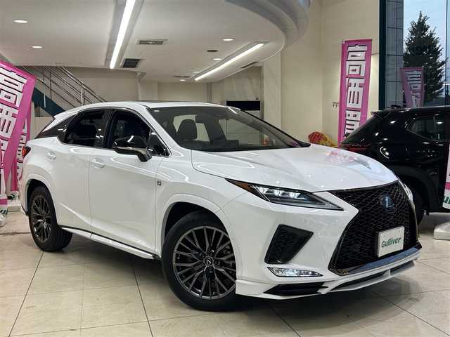 レクサス ＲＸ 300 Fスポーツ 東京都 2021(令3)年 1.5万km ホワイトノーヴァガラスフレーク 純正メーカーナビ/(CD/DVD/SD/MSV/BT/AUX/Miracast/フルセグTV)/全周囲カメラ/クリアランスソナー/TRDエアロフェンダー/TRDフロントスポイラー/サンルーフ/前後方ドライブレコーダー/デジタルインナーミラー/(ZRR038)/運転席メモリーシート/前席パワーシート/前席シートヒーター/エアシート/レザーシート/ヘッドアップディスプレイ/LTA/レーダークルーズコントロール/プリクラッシュセーフティー/BSM/RCTA/PKSB/RSA/TPMS/ステアリングヒーター/革巻きステアリング/パドルシフト/ステアリングスイッチ/電動格納ウインカーミラー/アイドリングストップ/電動パーキングブレーキ/オートホールド/横滑り防止機能/オートハイビーム/LED/ETC2.0/AC100V電源/後席サンシェード/後席プライバシーガラス/パワーバックドア/イージークローザー/トノカバー/チルトテレスコピック/純正フロアマット/置くだけ充電機能/ISOFIX