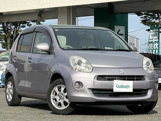 トヨタ パッソ プラスハナ 宮城県 2013(平25)年 9.1万km グレイッシュパープルメタリックオパール ワンオーナー/純正ディーラーオプションナビ/ワンセグTV/FM・AM/Bluetooth/CD/SD/純正フロアマット/リモコンキー/スペアキー(メカニカルキー)×1/鉄チンホイールスタッドレス積載/横滑り防止