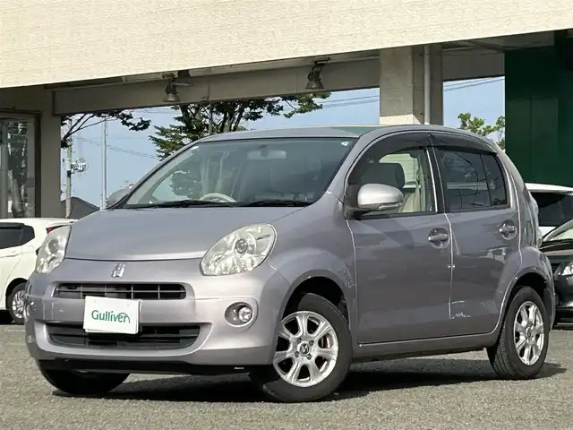 トヨタ パッソ プラスハナ 宮城県 2013(平25)年 9.1万km グレイッシュパープルメタリックオパール ワンオーナー/純正ディーラーオプションナビ/ワンセグTV/FM・AM/Bluetooth/CD/SD/純正フロアマット/リモコンキー/スペアキー(メカニカルキー)×1/鉄チンホイールスタッドレス積載/横滑り防止