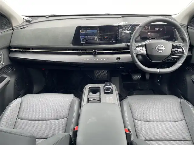 日産 アリア B9 e－4ORCE プレミア 熊本県 2024(令6)年 0.2万km パープル カラーコード：DAP（ミッドナイトパープル）/純正ナビ/・AM/FM/HDMI/BT/・AppleCarPlay/AndroidAuto/・フルセグTV/全周囲カメラ/・フロント/バック/サイド/プロパイロット/衝突防止支援/踏み間違い防止支援/後側方車両検知支援/後側方車両衝突防止支援/車両逸脱警報/車両逸脱防止支援/駐車支援/オートマチックハイビーム/純正革巻きステアリング/・ステアリングスイッチ/レザーシート/・D/N席パワーシート/・D/N席シートヒーター/・全席シートヒーター/オートライト/・LEDライト/・フォグランプ/デジタルインナーミラー/電動アームレスト/サンルーフ/ETC2.0/BOSEプレミアムサウンド/前後ドライブレコーダー/電動格納ミラー/・ウィンカーミラー/e-pedal/置くだけ充電/電動サイドブレーキ/・オートホールドボタン/パワーバックドア/フルエアロ/純正ドアバイザー/純正アルミホイール/純正フロアマット/スマートキー/・スペアキー