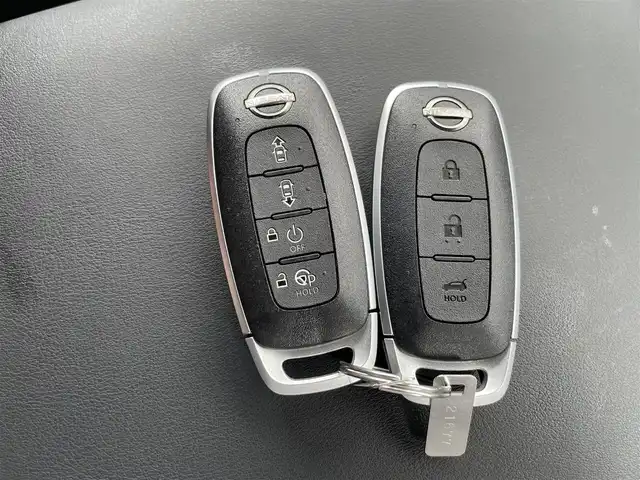 日産 アリア B9 e－4ORCE プレミア 熊本県 2024(令6)年 0.2万km パープル カラーコード：DAP（ミッドナイトパープル）/純正ナビ/・AM/FM/HDMI/BT/・AppleCarPlay/AndroidAuto/・フルセグTV/全周囲カメラ/・フロント/バック/サイド/プロパイロット/衝突防止支援/踏み間違い防止支援/後側方車両検知支援/後側方車両衝突防止支援/車両逸脱警報/車両逸脱防止支援/駐車支援/オートマチックハイビーム/純正革巻きステアリング/・ステアリングスイッチ/レザーシート/・D/N席パワーシート/・D/N席シートヒーター/・全席シートヒーター/オートライト/・LEDライト/・フォグランプ/デジタルインナーミラー/電動アームレスト/サンルーフ/ETC2.0/BOSEプレミアムサウンド/前後ドライブレコーダー/電動格納ミラー/・ウィンカーミラー/e-pedal/置くだけ充電/電動サイドブレーキ/・オートホールドボタン/パワーバックドア/フルエアロ/純正ドアバイザー/純正アルミホイール/純正フロアマット/スマートキー/・スペアキー