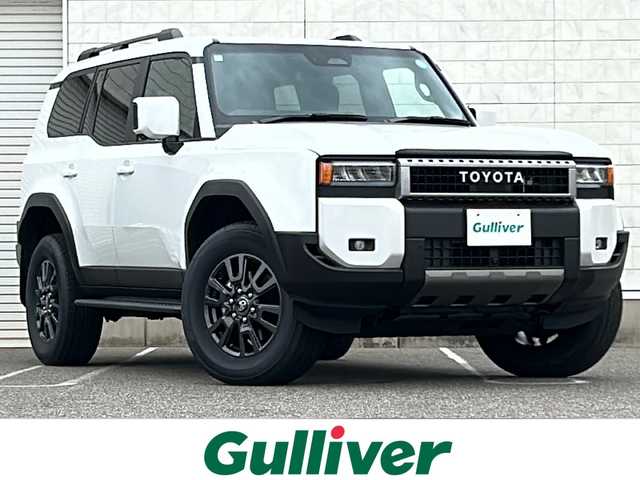 トヨタ ランドクルーザー ２５０ VX 新潟県 2024(令6)年 0.9万km プラチナホワイトパールマイカ ワンオーナー/ムーンルーフ/衝突軽減/全方位カメラ/純正12.3インチディスプレイオーディオ/(AM/FM/BT/フルセグ)/ETC2.0/デジタルインナーミラー/レーダークルーズコントロール/パワーバックドア/コーナーセンサー/ルーフレール/黒革ーシート/シートヒーター/エアーシート/ハンドルヒーター/革巻きステアリング/ステアリングスイッチ/AUTOライト/AUTOハイビーム/LEDヘッドライト/プッシュスタート/スマートキー/スペアキー