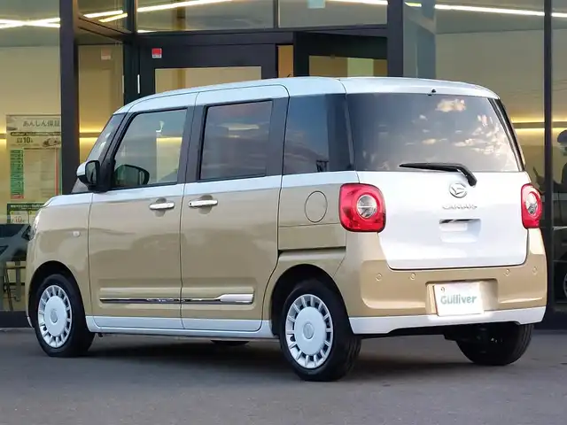 ダイハツ ムーヴ キャンバス ストライプス G ターボ 東京都 2022(令4)年 4.1万km シャイニングホワイトパール/サンドベージュメタリック 純正10インチナビ(NMZN-Z72DS)/【FM/AM/BT/TV/HDMI/SD/USB/ipod/DISC】/バックカメラ/ETC/レーダークルーズコントロール/衝突軽減ブレーキ/横滑り防止/アイドリングストップ/両側電動スライドドア/シートヒーター/コーナーセンサー/LEDヘッドライト/フォグランプ/ホッとカップホルダー/電子パーキング/プッシュスタート/スマートキー/スペアキー×1