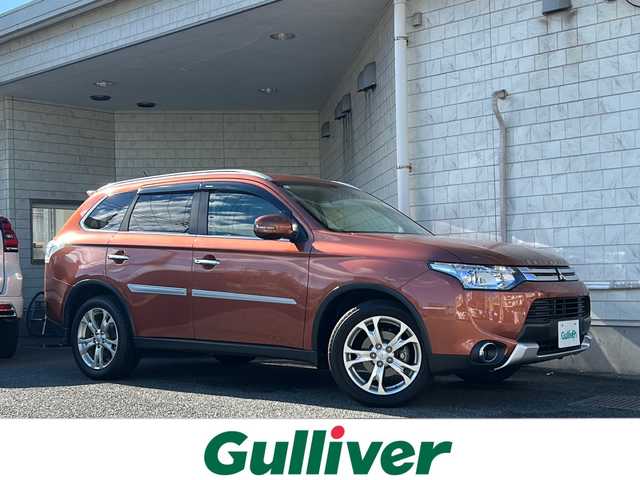 三菱 アウトランダー 24G ナビパッケージ 神奈川県 2014(平26)年 8.3万km カッパーメタリック 4WD/ワンオーナー/純正ナビ(CD/DVD/SD/BT/フルセグTV)/バック・サイドカメラ/ロックフォードサウンドシステム/衝突被害軽減ブレーキ/レーンキープアシスト/横滑り防止装置/アイドリングストップ/レーダークルーズコントロール/パドルシフト/ルーフレール/パワーバックドア/ETC/純正フロアマット/純正ドアバイザー/ISOFIX/スペアキー×1/保証書/取扱説明書
