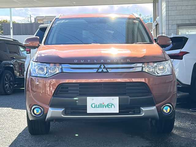 三菱 アウトランダー 24G ナビパッケージ 神奈川県 2014(平26)年 8.3万km カッパーメタリック 4WD/ワンオーナー/純正ナビ(CD/DVD/SD/BT/フルセグTV)/バック・サイドカメラ/ロックフォードサウンドシステム/衝突被害軽減ブレーキ/レーンキープアシスト/横滑り防止装置/アイドリングストップ/レーダークルーズコントロール/パドルシフト/ルーフレール/パワーバックドア/ETC/純正フロアマット/純正ドアバイザー/ISOFIX/スペアキー×1/保証書/取扱説明書