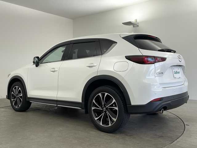 マツダ ＣＸ－５ 25S Lパッケージ 兵庫県 2023(令5)年 2万km スノーフレイクホワイトパールマイカ ・純正ナビ&TV&BT&USB&スマートフォン連携/・全方位カメラ/・ETC/・純正前後ドライブレコーダー/・レーダークルーズコントロール/・i-ACTIVSENSE/・レーンキープアシスト/・車線逸脱警報/・前後コーナーセンサー/・HUD/・BSM/・衝突軽減ブレーキ/・LEDオートライト/・オートマチックハイビーム/・パワーバックドア/・パドルシフト/・レザーシート/・シートヒーター/・パワーシート/・メモリーシート/・ステアリングヒーター/・純正19インチアルミホイール/・純正フロアマット/・電動パーキングブレーキ/・ブレーキホールド/・スマートキー/・プッシュスタート/・防眩ミラー