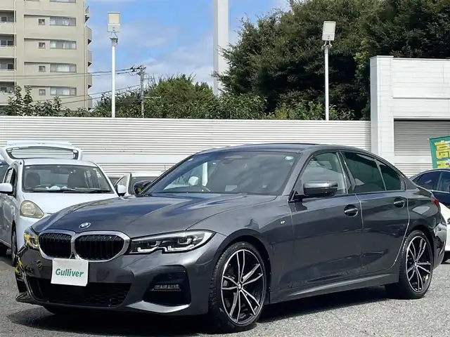 ＢＭＷ ３２０ｉ Mスポーツ 東京都 2020(令2)年 2万km ミネラルグレー 純正ナビ/（BT/FM/AM/Apple CarPlay/Android Auto）/アクティブクルーズコントロール/レーンチェンジアシスト/レーンコントロールアシスト/レーンチェンジウォーニング/オートマチックハイビーム/全方位カメラ/コーナーセンサー/パドルシフト/シートヒーター（D/N）/パワーシート（D/N）/オートホールド/ハーフレザーシート/パワーバックドア/スマートキー/スペアキー/ETC2.0