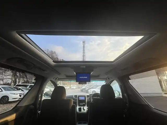 トヨタ アルファード 240S プライムセレⅡ ゴールド 栃木県 2011(平23)年 9.7万km ホワイトパールクリスタルシャイン (株)IDOMが運営する【じしゃロン宇都宮店】の自社ローン対象車両になります。こちらは現金ご利用時の価格です。自社ローンご希望の方は別途その旨お申付け下さい。/サンルーフ/フリップダウンモニター/社外ナビ/バックカメラ/両側パワースライドドア/フルセグ/Ｂｌｕｅｔｏｏｔｈ/ＥＴＣ/スマートキー/パワーバックドア/ＨＩＤヘッドライト/オートライト