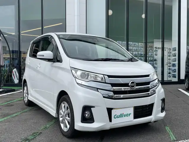 日産 デイズ ハイウェイスターX 長崎県 2017(平29)年 10.7万km ホワイトパール 全方位カメラ/純正ナビ/アラウンドビューモニター/エマージェンシーブレーキ/オートライト/ＨＩＤ/スマートキー/スペアキー/オートハイビーム/ステアリングスイッチ/横滑り防止