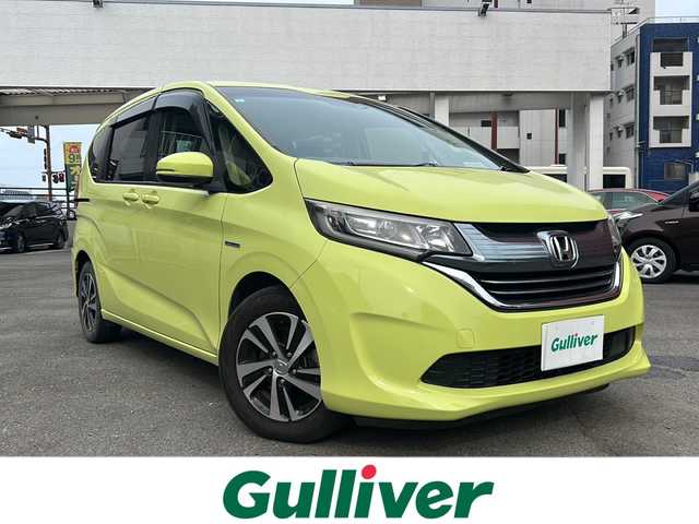 ホンダ フリード ハイブリット EX 宮崎県 2017(平29)年 14.4万km シトロンドロップ カロッツェリアナビ（AM/FM/CD/Bluetooth/フルセグTV）/バックカメラ/両側パワースライドドア/レーダークルコン/ETC/前席シートヒーター/衝突軽減ブレーキ/純正ドアバイザー/純正フロアマット