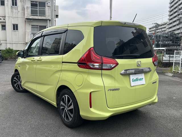ホンダ フリード ハイブリット EX 宮崎県 2017(平29)年 14.4万km シトロンドロップ カロッツェリアナビ（AM/FM/CD/Bluetooth/フルセグTV）/バックカメラ/両側パワースライドドア/レーダークルコン/ETC/前席シートヒーター/衝突軽減ブレーキ/純正ドアバイザー/純正フロアマット