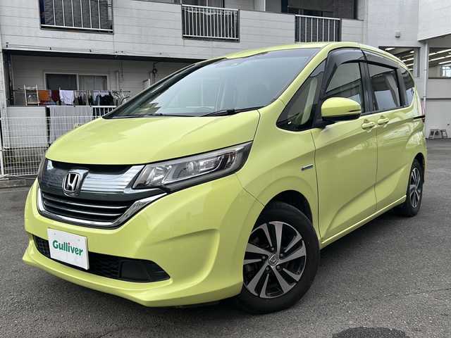 ホンダ フリード ハイブリット EX 宮崎県 2017(平29)年 14.4万km シトロンドロップ カロッツェリアナビ（AM/FM/CD/Bluetooth/フルセグTV）/バックカメラ/両側パワースライドドア/レーダークルコン/ETC/前席シートヒーター/衝突軽減ブレーキ/純正ドアバイザー/純正フロアマット