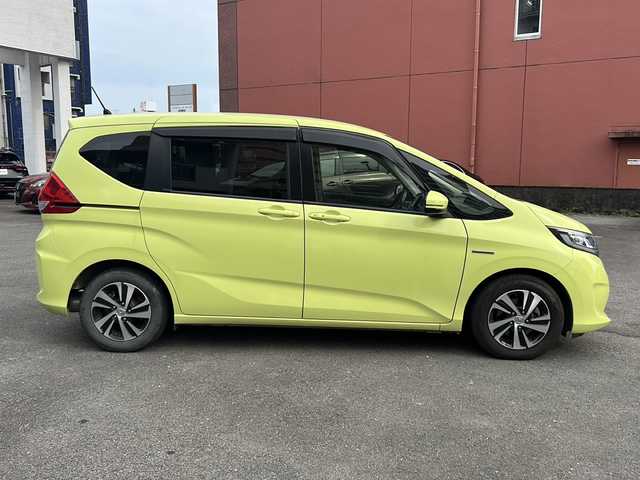 ホンダ フリード ハイブリット EX 宮崎県 2017(平29)年 14.4万km シトロンドロップ カロッツェリアナビ（AM/FM/CD/Bluetooth/フルセグTV）/バックカメラ/両側パワースライドドア/レーダークルコン/ETC/前席シートヒーター/衝突軽減ブレーキ/純正ドアバイザー/純正フロアマット