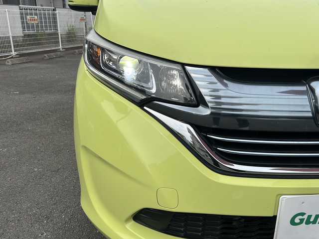 ホンダ フリード ハイブリット EX 宮崎県 2017(平29)年 14.4万km シトロンドロップ カロッツェリアナビ（AM/FM/CD/Bluetooth/フルセグTV）/バックカメラ/両側パワースライドドア/レーダークルコン/ETC/前席シートヒーター/衝突軽減ブレーキ/純正ドアバイザー/純正フロアマット