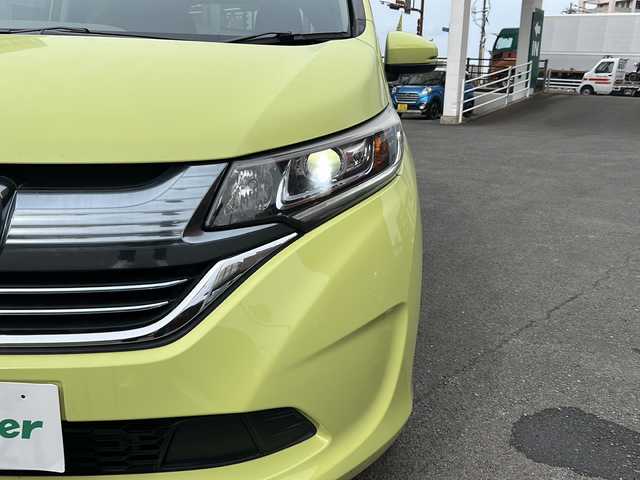 ホンダ フリード ハイブリット EX 宮崎県 2017(平29)年 14.4万km シトロンドロップ カロッツェリアナビ（AM/FM/CD/Bluetooth/フルセグTV）/バックカメラ/両側パワースライドドア/レーダークルコン/ETC/前席シートヒーター/衝突軽減ブレーキ/純正ドアバイザー/純正フロアマット
