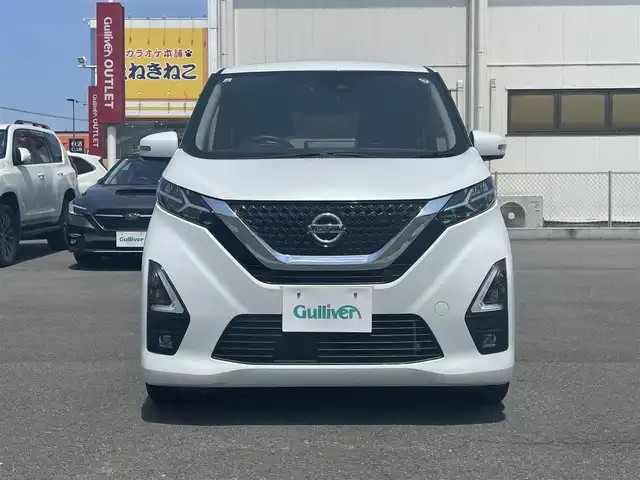 日産 デイズ ハイウェイスターG ターボ 群馬県 2021(令3)年 7万km ホワイトパール 安全装備/・衝突軽減ブレーキ/・アラウンドビューモニター/・コーナーセンサー/・オートライト/・オートマチックハイビーム/・横滑り防止/・SOSコール/純正９インチナビ/・AM/FM/CD/DVD/・Bluetooth/NSV/・SD/フルセグTV/LEDヘッドライト/LEDフォグランプ/ドライブレコーダー前後/ETC/純正ドアバイザー/純正フロアマット/スマートキー/プッシュスタート