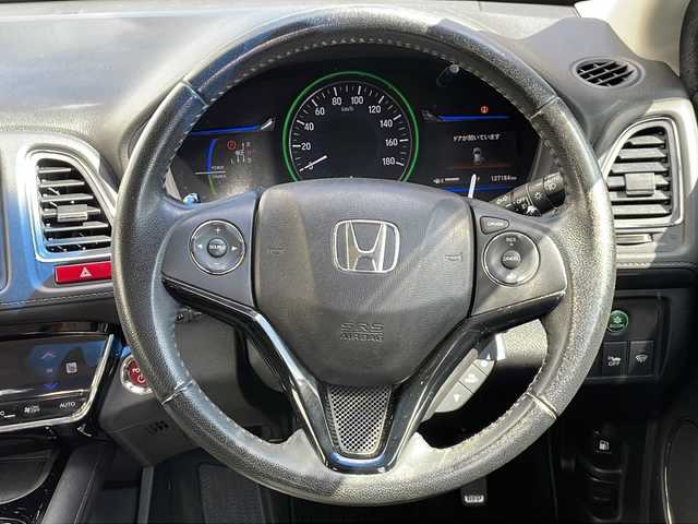 ホンダ ヴェゼル ハイブリッド Z 埼玉県 2014(平26)年 12.8万km ルーセブラックM (株)IDOMが運営する【じしゃロン熊谷店】の自社ローン専用車両になりますこちらは現金またはオートローンご利用時の価格です。自社ローンご希望の方は別途その旨お申付け下さい/純正ナビ　（VXM-142VFi）/　フルセグTV　CD/DVD/SD/Bluetooth/ワンオーナー/プッシュスタート/ステアリングスイッチ/バックカメラ/クルーズコントロール/ECONスイッチ/横滑り防止/純正フロアマット/純正17インチAW/ルーフレール/ECON/全席オートウインドウ/電子サイドブレーキ