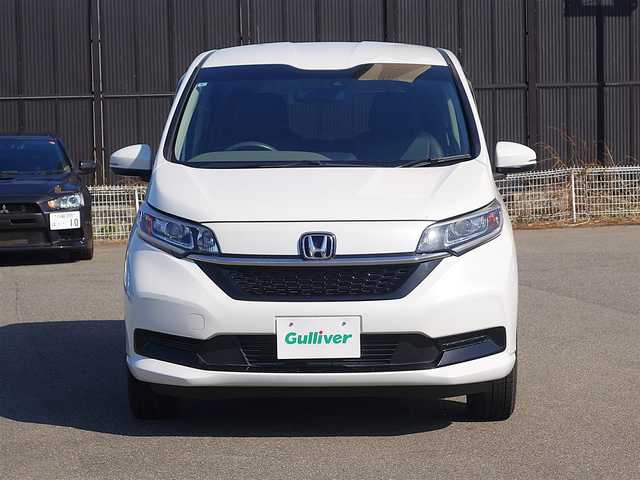 ホンダ フリード G ホンダセンシング 山形県 2021(令3)年 2.4万km プラチナホワイトパール 4WD/ホンダセンシング/純正メモリナビ/　　【CD DVD BT フルセグ USB】/バックカメラ/両側パワースライドドア/ETC/レーダークルーズコントロール/LEDオートヘッドライト/シートヒーター/レザー調シートカバー/アイドリングストップ/ステアリングスイッチ/電動格納ウィンカーミラー/ミラーヒーター/スマートキー