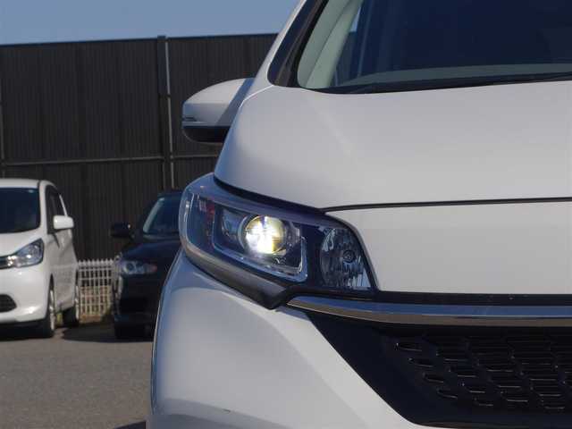 ホンダ フリード G ホンダセンシング 山形県 2021(令3)年 2.4万km プラチナホワイトパール 4WD/ホンダセンシング/純正メモリナビ/　　【CD DVD BT フルセグ USB】/バックカメラ/両側パワースライドドア/ETC/レーダークルーズコントロール/LEDオートヘッドライト/シートヒーター/レザー調シートカバー/アイドリングストップ/ステアリングスイッチ/電動格納ウィンカーミラー/ミラーヒーター/スマートキー