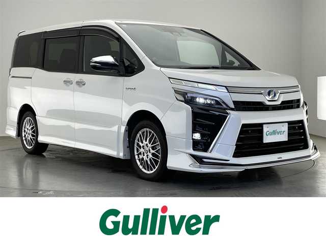 トヨタ ヴォクシー ハイブリッド ZS 煌Ⅱ 愛知県 2020(令2)年 6万km ホワイトパールクリスタルシャイン 純正１０型ナビ　フルセグＴＶ　シートヒーター　バックカメラ　ハーフレザーシート　両側パワスラ　セーフティセンス　衝突軽減装置　クルコン　車線逸脱　ＬＥＤオートライト　コーナーセンサー　フォグ　禁煙車