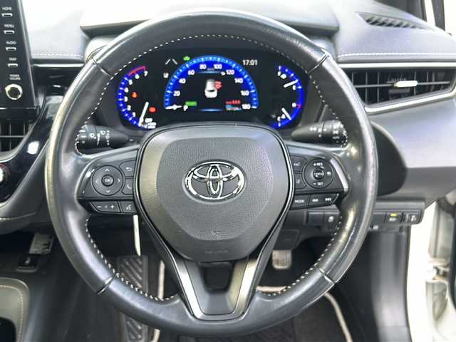 トヨタ カローラツーリング ハイブリッド ダブルバイビー 石川県 2019(令1)年 14.8万km ホワイトパールクリスタルシャイン ワンオーナー/4WD/トヨタセーフティーセンス/レーダークルーズコントロール/純正ディスプレイオーディオ(ナビ付)/【Bluetooth・フルセグTV・Miracast】/置くだけ充電/前席シートヒーター/ステアリングスイッチ/・ステアリングヒーター/ヘッドアップディスプレイ/ビルトインETC2.0