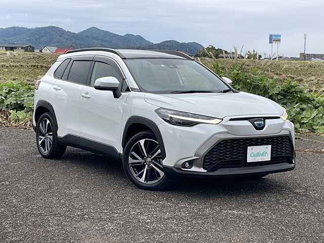 トヨタ カローラ クロス ハイブリッド Z 新潟県 2022(令4)年 3.9万km プラチナホワイトパールマイカ 4WD/純正ディスプレイオーディオ/BT/USB/全方位カメラ/ETC/ドライブレコーダー/衝突被害軽減ブレーキ/レーンキープアシスト/レーダークルーズコントロール/ガラスルーフ/半革シート/運転席パワーシート/シートヒーター /ステアリングヒーター/ステアリングスイッチ/パワーバックドア/コーナーセンサー/スマートキー/プッシュスタート/LEDヘッドライト/オートライト/オートハイビーム/フォグランプ/純正18インチアルミホイール