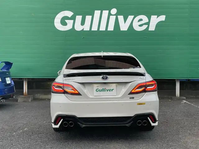 トヨタ クラウン ハイブリッド RS 東京都 2018(平30)年 4.7万km ホワイトパールクリスタルシャイン ワンオーナー/トランクスポイラー/サイドスカート/フロントスポイラー/リアバンパー/マフラー(TRD)/バックカメラ/TコネクトSDナビゲーションシステム/・SD8インチナビ/(フルセグTV/Blu-ray/DVD/USB/AUX/Bluetooth)/セーフティーセンス/・レーントレーシングアシスト/・レーダークルーズコントロール/・プリクラッシュセーフティー/・アダプティブハイビーム/ドライブレコーダー/三眼LEDヘッドランプ/シーケンシャルターンランプ/パワーシート(運転席＆助手席)/シートヒーター(運転席＆助手席)/ステアリングヒーター/革巻きステアリング/パドルシフト/ETC2.0/保証書/取扱説明書/スペアキー×1