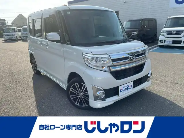 ダイハツ タント カスタム RS 和歌山県 2015(平27)年 7.1万km パールホワイトⅢ (株)IDOMが運営する【じしゃロン和歌山店】の自社ローン専用車両になります。/こちらは現金またはオートローンご利用時の価格です。自社ローンご希望の方は別途その旨お申付け下さい/ターボ/両側パワースライドドア/純正ナビ/（AM/FM/CD/DVD/SD/USB/HDMI/Bluetooth/ワンセグTV）/アイドリングストップ/ハンズフリー/リヤデフロスター/ドライブレコーダー（前後）/純正フロアマット/純正アルミホイール/プッシュスタート/オートライト/フォグランプ/電格ミラー/保証書/取扱説明書